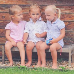 bigstock-Funny-siblings-on-a-rural-benc-49242554-1