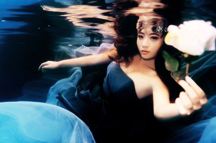 Asian girl underwater